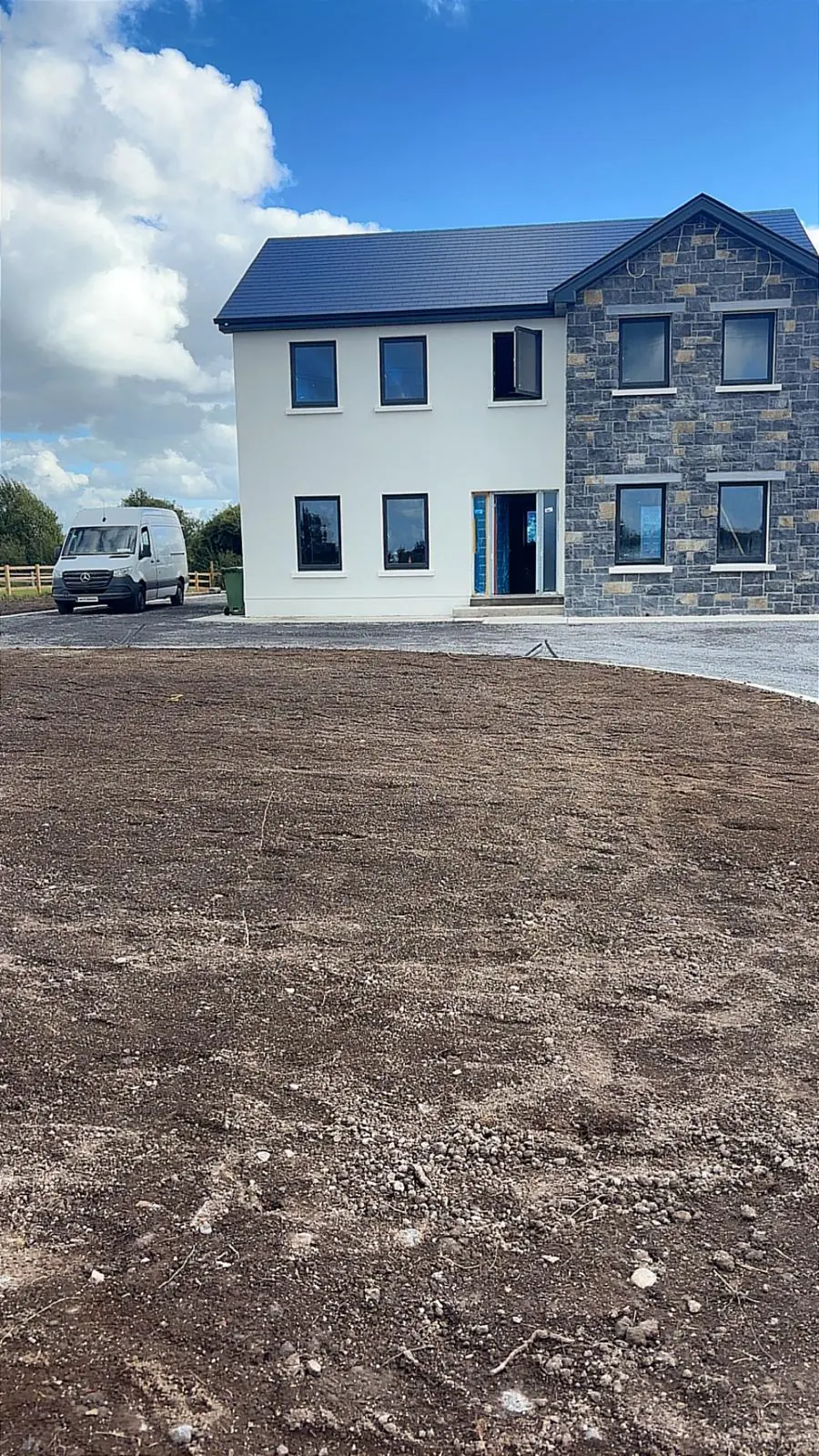 Stone and render house exterior during construction